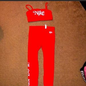 Red 2 piece women’s Nike set